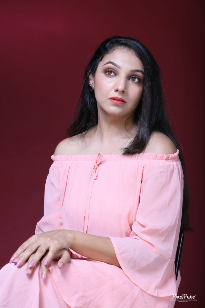 Nupur Daithankar pink dress rose portrait