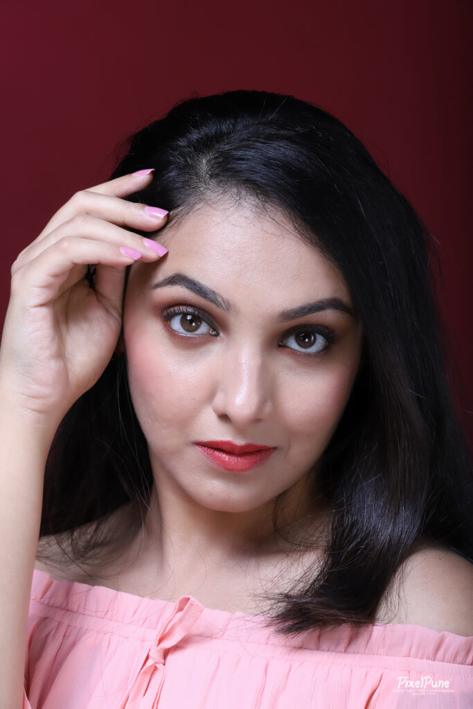 Nupur Daithankar pink dress rose portrait