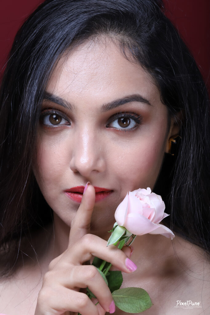 Nupur Daithankar pink dress rose portrait