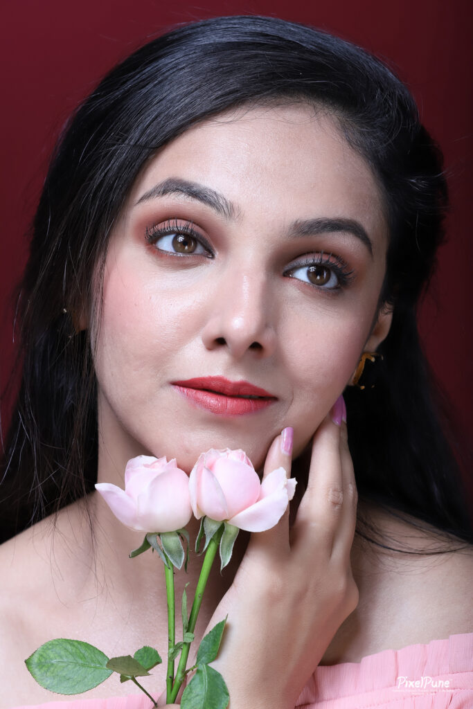 Nupur Daithankar pink dress rose portrait