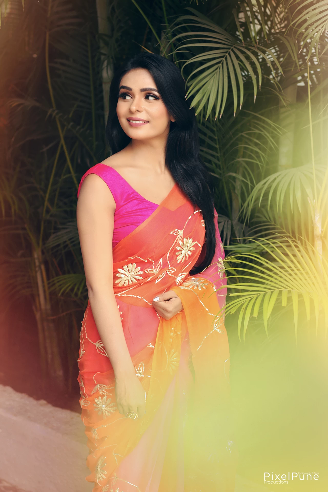 Sonal Vengurlekar shoot in orange pink saree