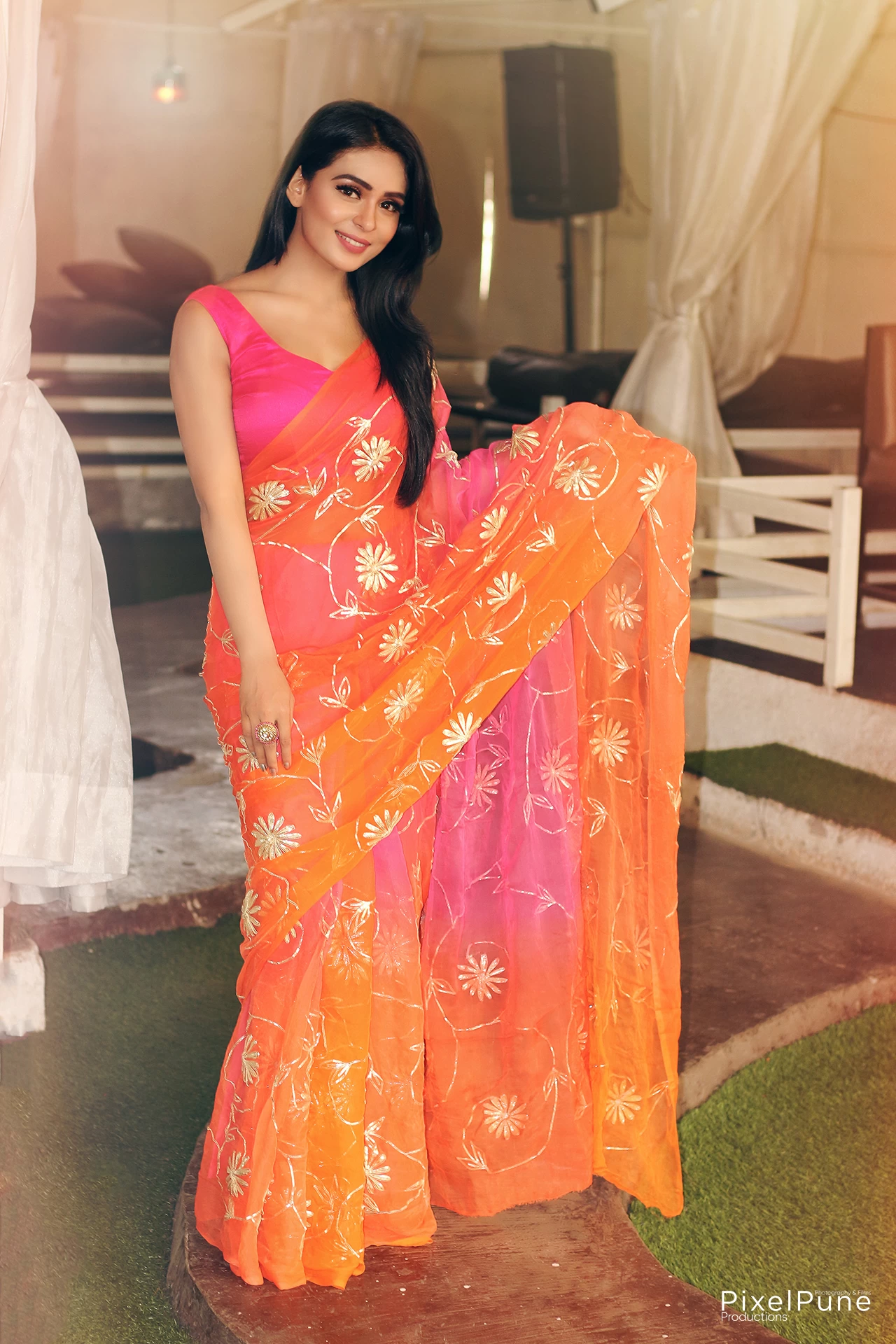 Sonal Vengurlekar shoot in orange pink saree