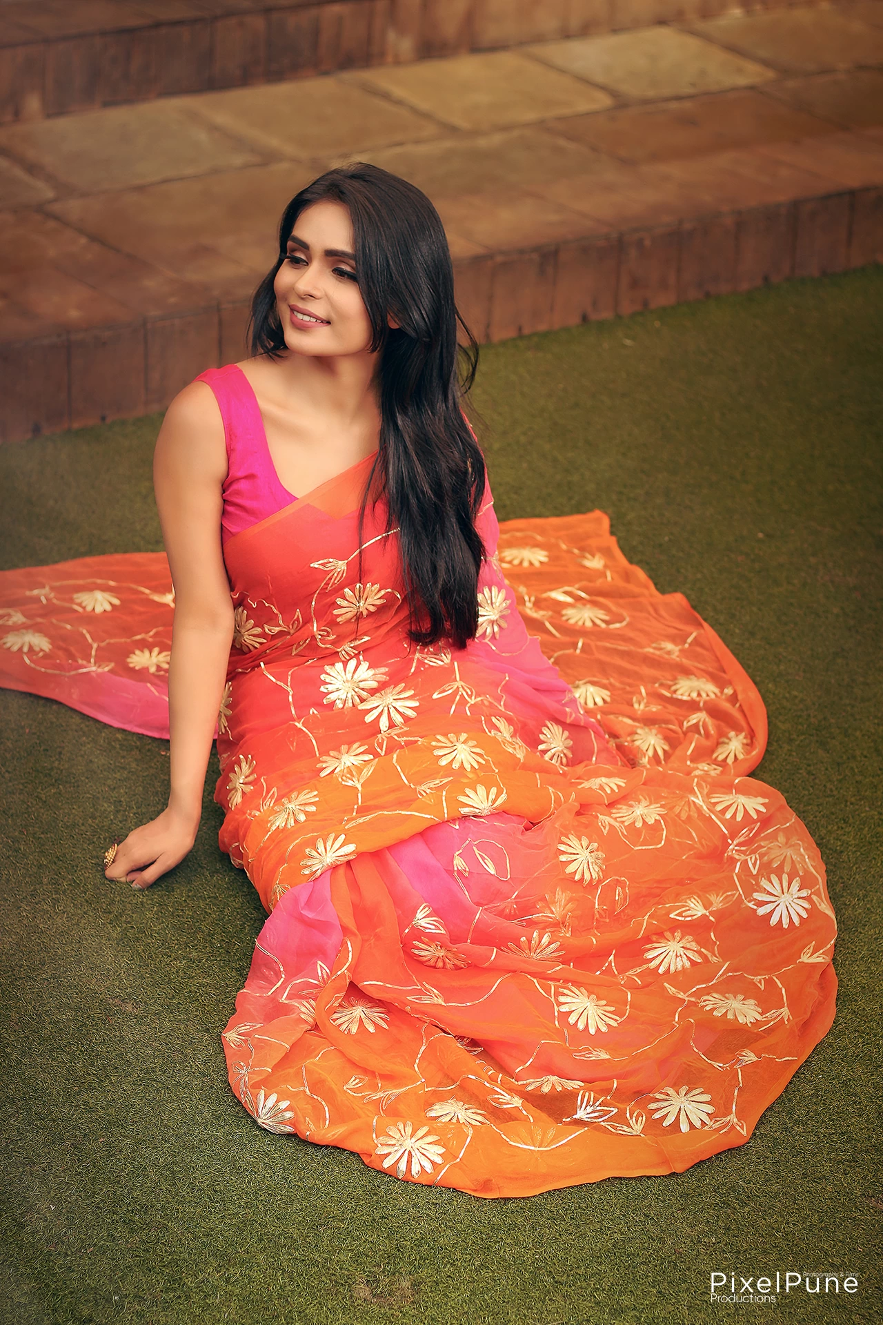 Sonal Vengurlekar shoot in orange pink saree